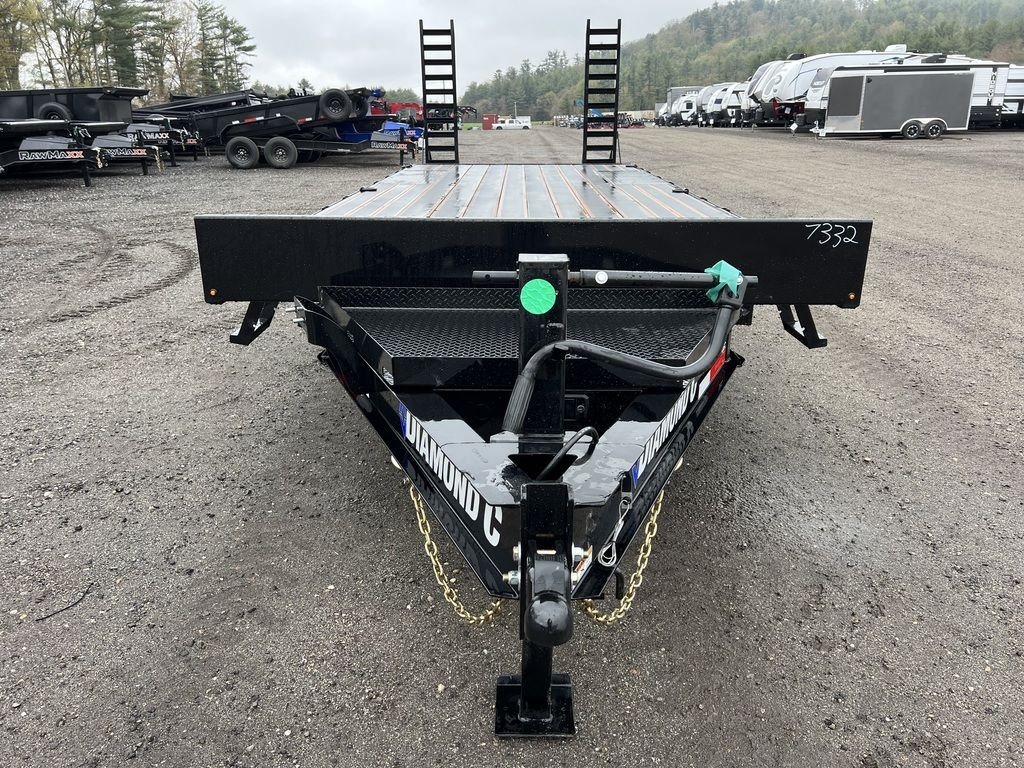2024 Diamond C 24 ft Deckover – Blackwood Deck – Straight front view of a black deckover trailer showing the coupler and tongue area