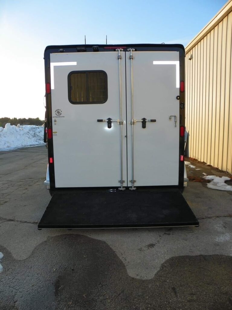 2022 Double D 2 Horse Bumper Pull – Reverse Slant – Rear view of closed double doors above the lowered loading ramp