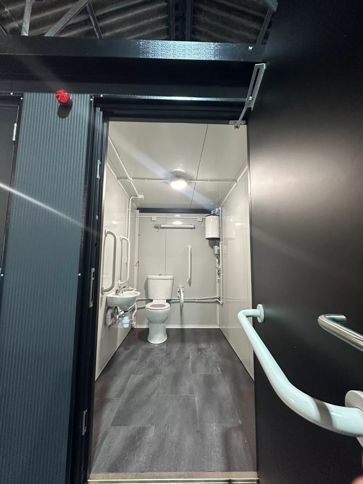 Custom Shipping Container Restroom – Three Private Compartments – Accessible restroom with toilet, small sink and grab rails