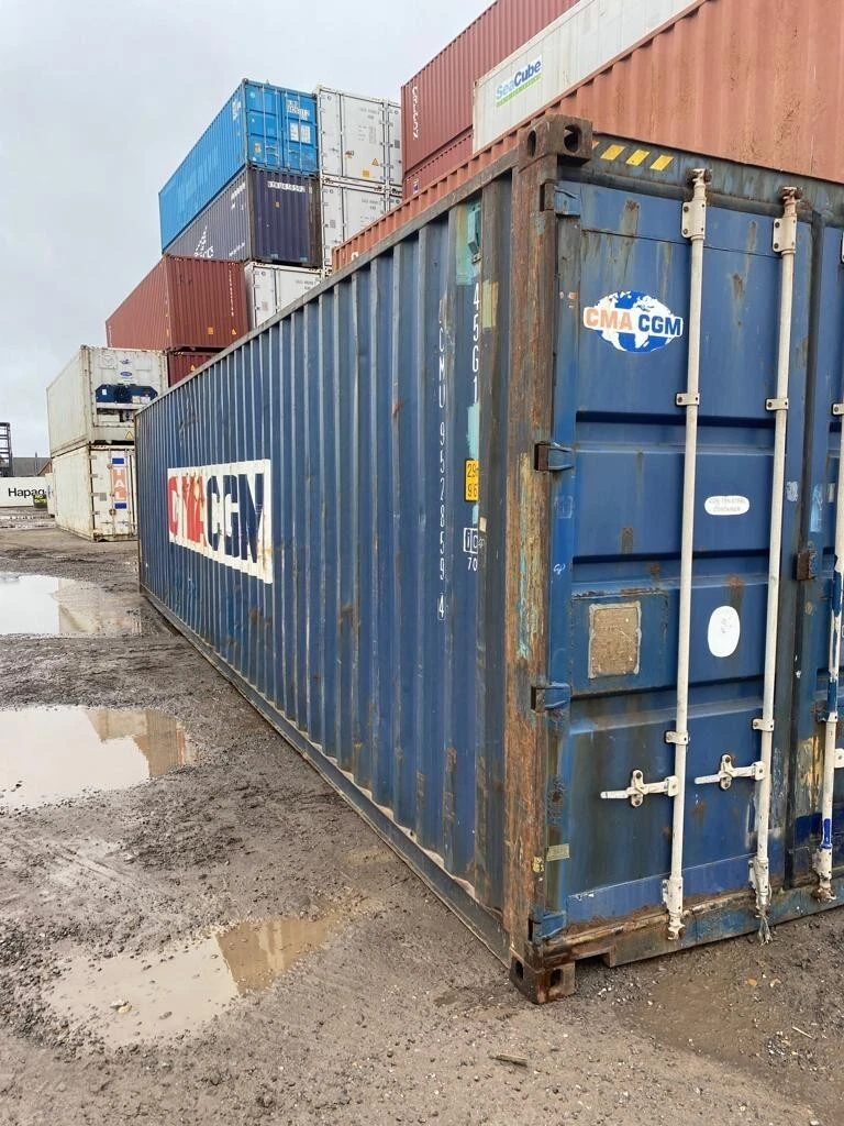 40ft Used Shipping Container – Standard Dry Storage – weathered blue shipping container with closed doors in storage yard