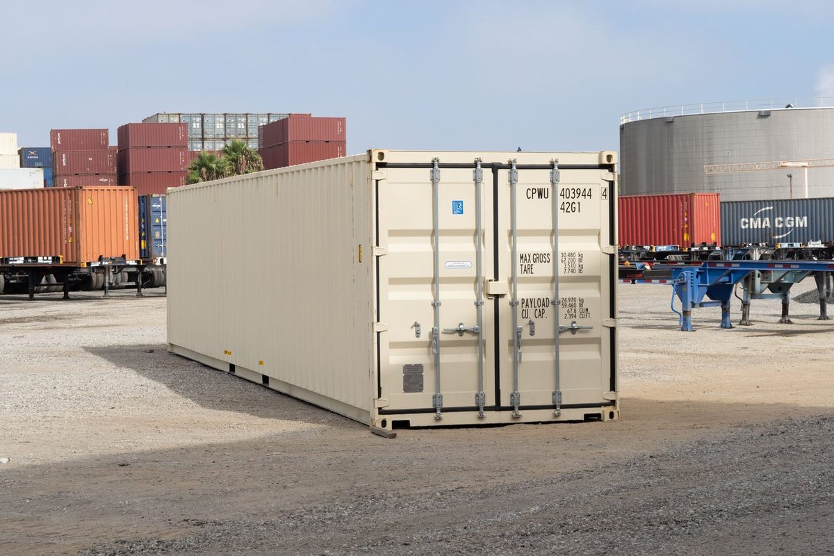 40ft Standard Shipping Container – New One-Trip – three-quarter exterior view of beige container with cargo doors closed