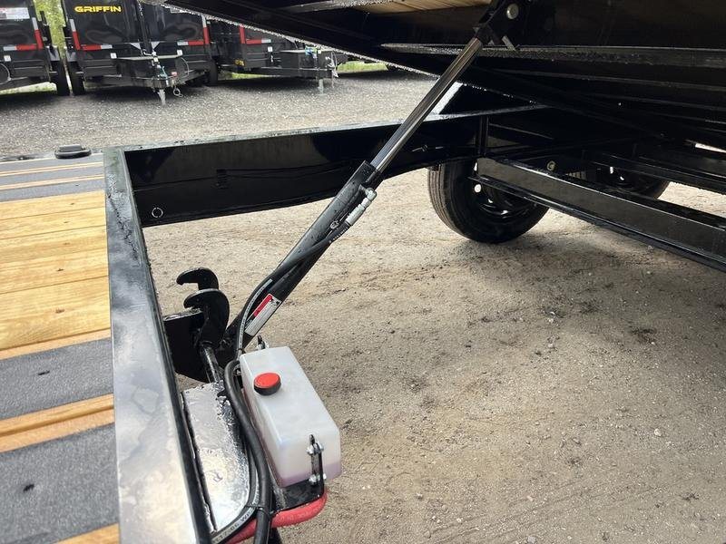 2024 Diamond C 24 ft Tilt Trailer – Spare Mount – View of the hydraulic lift cylinder system underneath the tilting trailer deck