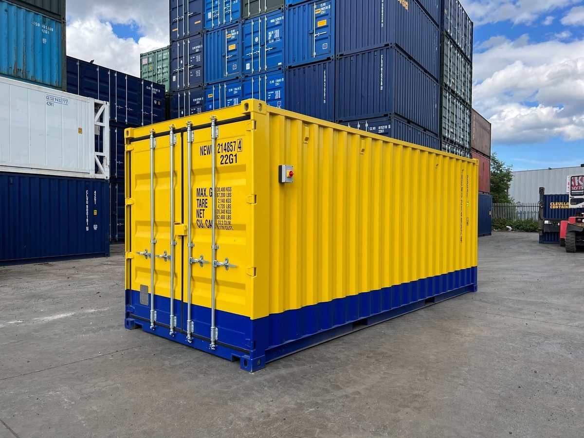 20ft One-Trip Modified Shipping Container – Electrical and LEDs – three-quarter exterior view of yellow container with closed cargo doors