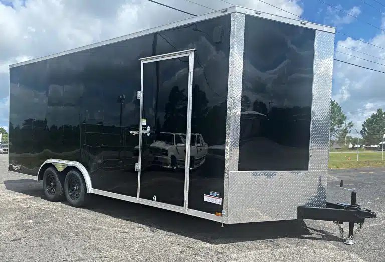 2026 Millennium 20 ft Car Trailer – Extra Height – Side profile of black car trailer showing side entry door and tandem axles