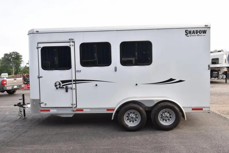 2021 Shadow 3 Horse Trailer – Fold-In Tack Wall – Opposite side of the white horse trailer showing double drop windows