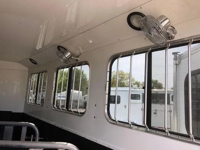 2010 Merhow 3 Horse Bumper Pull Trailer – Rear Ramp – Two silver electric fans mounted to the interior ceiling of the trailer