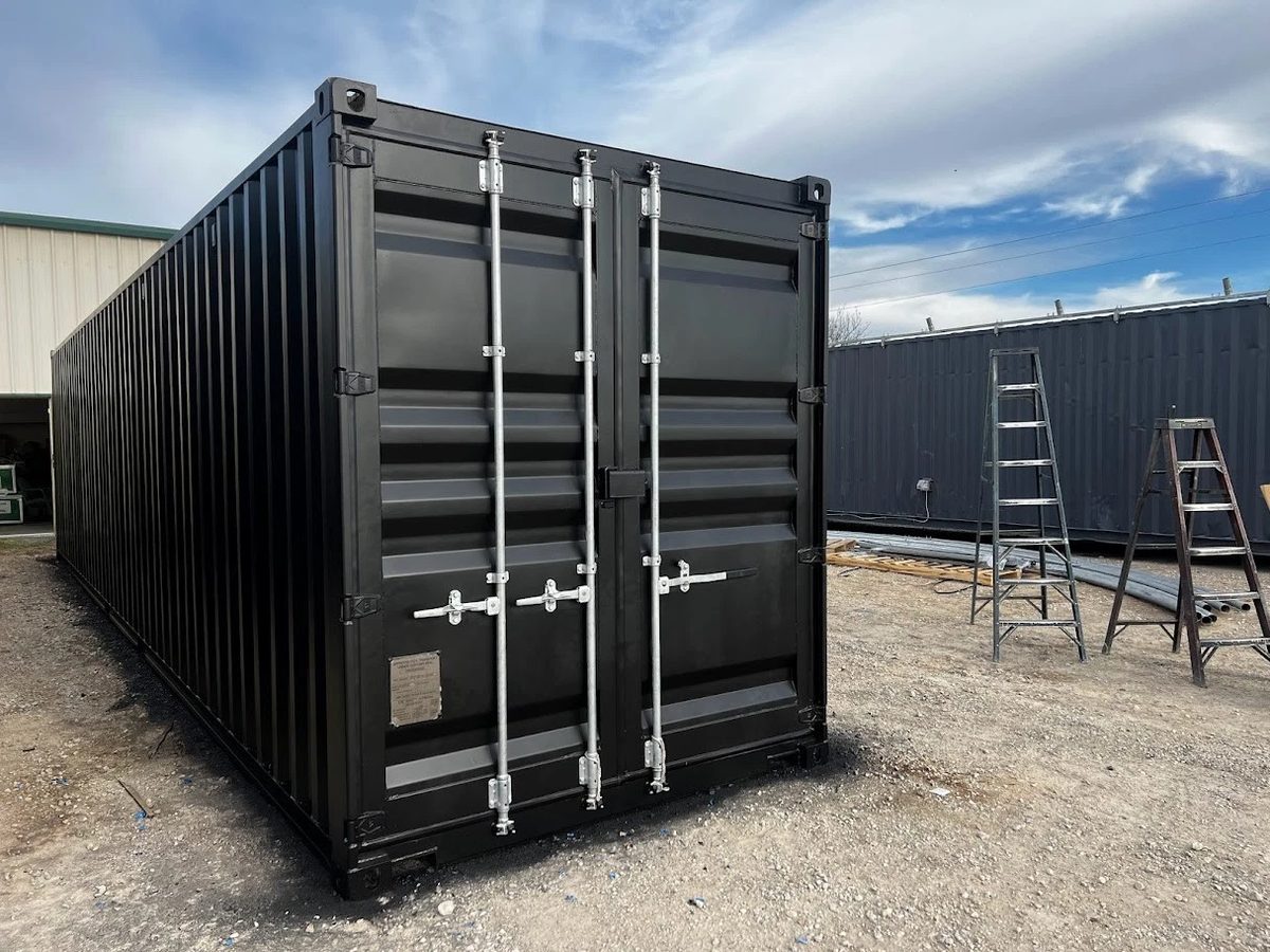 40ft Modified Shipping Container – Three Roll-Up Side Doors – three-quarter exterior view of black container with cargo doors closed