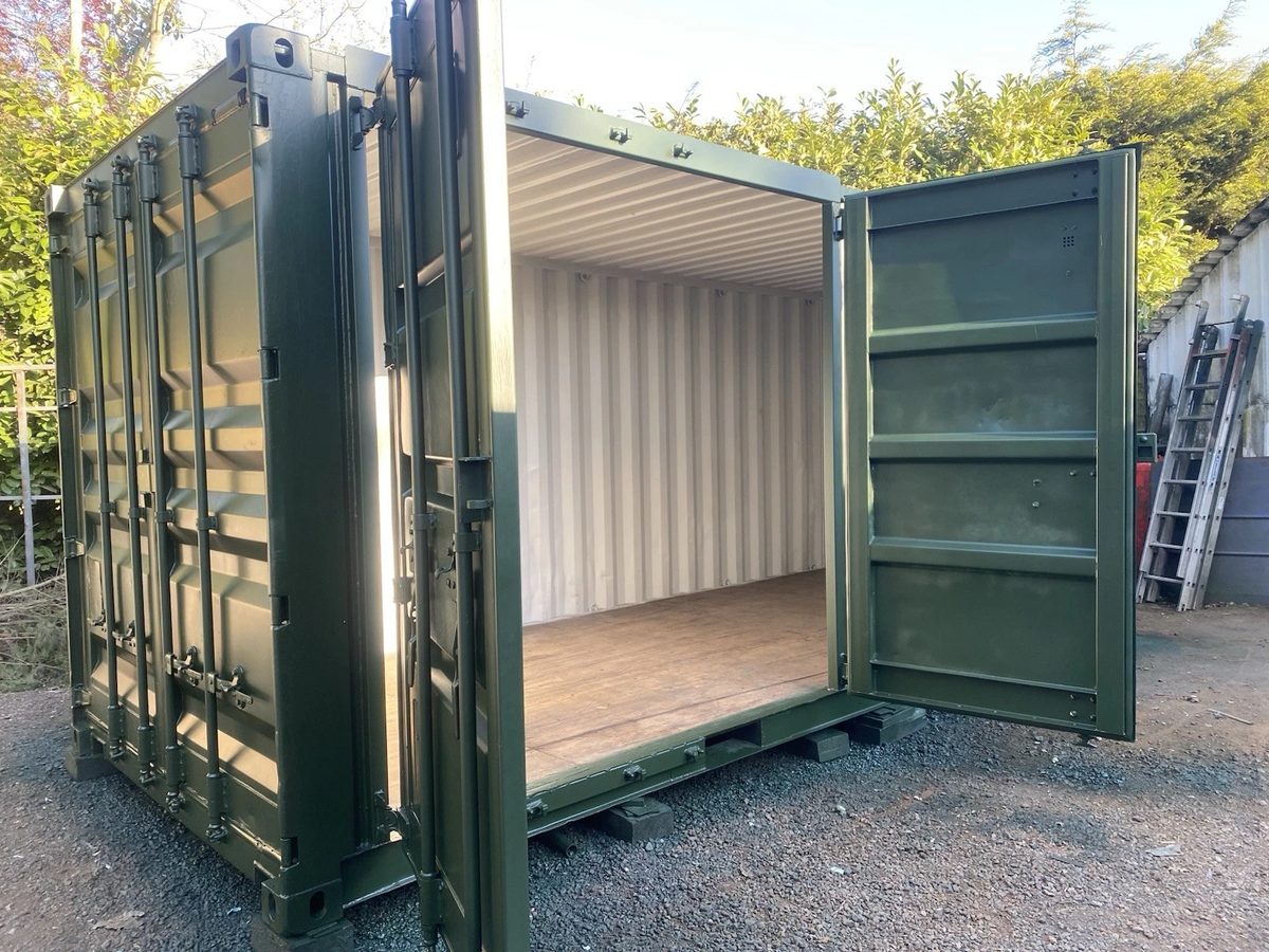20ft Refurbished Shipping Container – Full-Length Side Access – green container with side doors open and empty interior