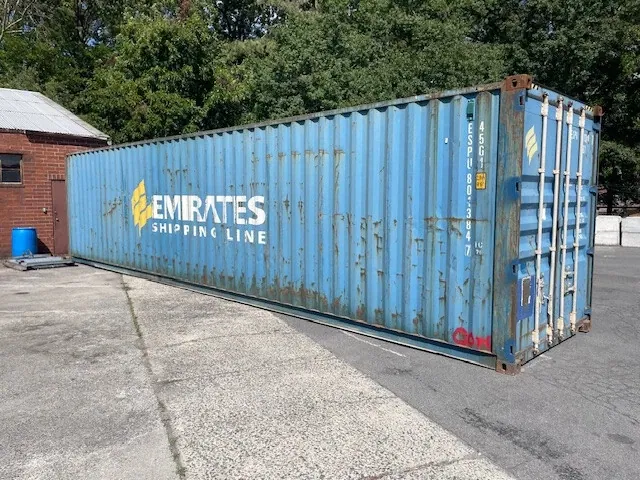 40ft High Cube Shipping Container – Used, Locking Doors – three-quarter exterior view of weathered container with cargo doors closed