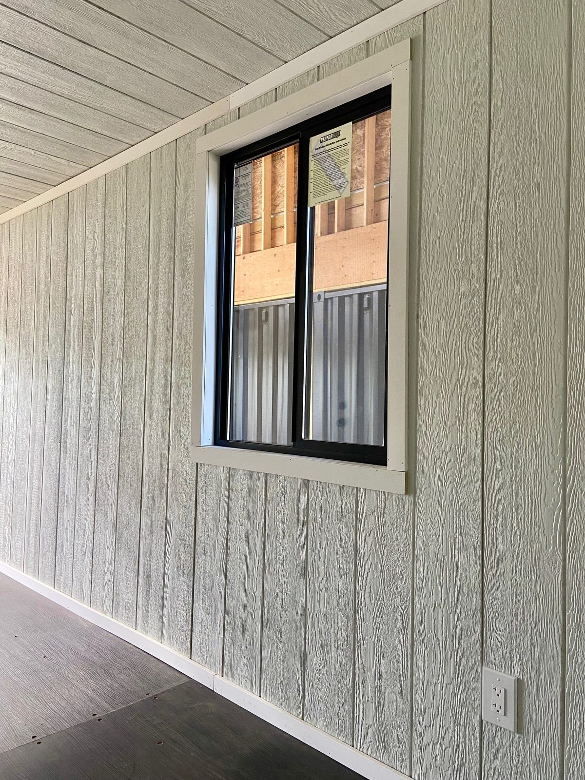 20ft Modular Container Office – LED Lighting, Two Windows – interior window with textured wall panels and electrical outlet