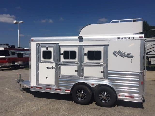 2018 Platinum Coach 3 Horse Bumper Pull – Rear Tack – Street side of the trailer featuring three drop down feed windows and hay rack