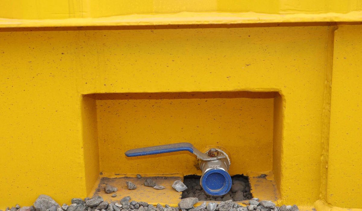20ft Dangerous Goods Container – Bunded Floor and Ventilation – close-up of recessed drain valve on yellow container
