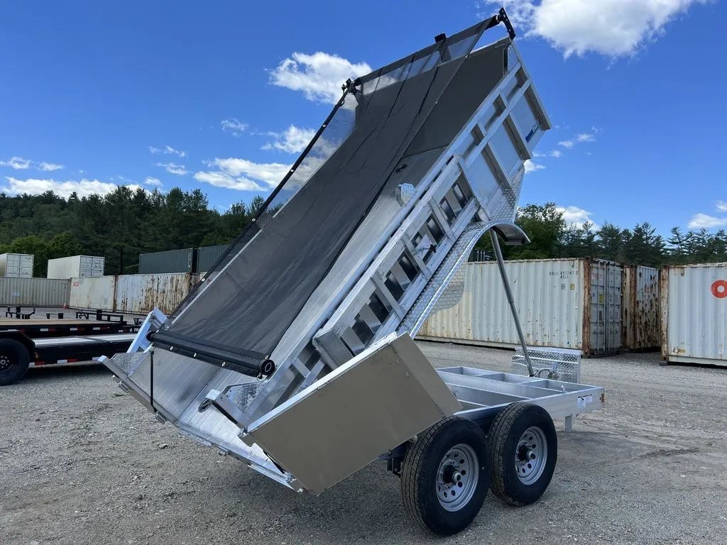 2024 Cargo Pro 12 ft Dump Trailer – Aluminum – Rear angle view of the raised dump bed with the black tarp extended