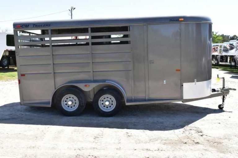 2017 CM 3HSLBP 3 Horse Trailer – Galvanneal, Dressing Room – Right side profile view of the trailer showing the escape door and axles