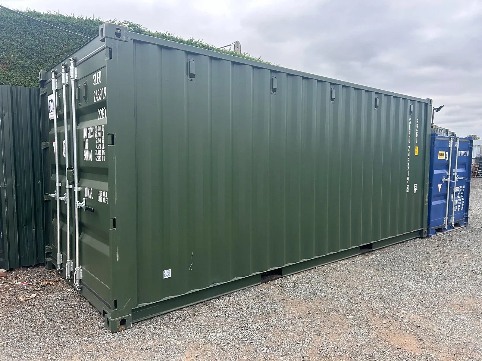 20ft New Shipping Container – One-Trip, Double Doors – three-quarter exterior view of green container with closed cargo doors