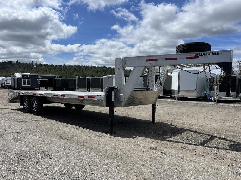 2024 Alum-Line 24 ft Gooseneck – Flip-Over Ramps – Front three-quarter side view of the gooseneck trailer showing the hitch and jacks