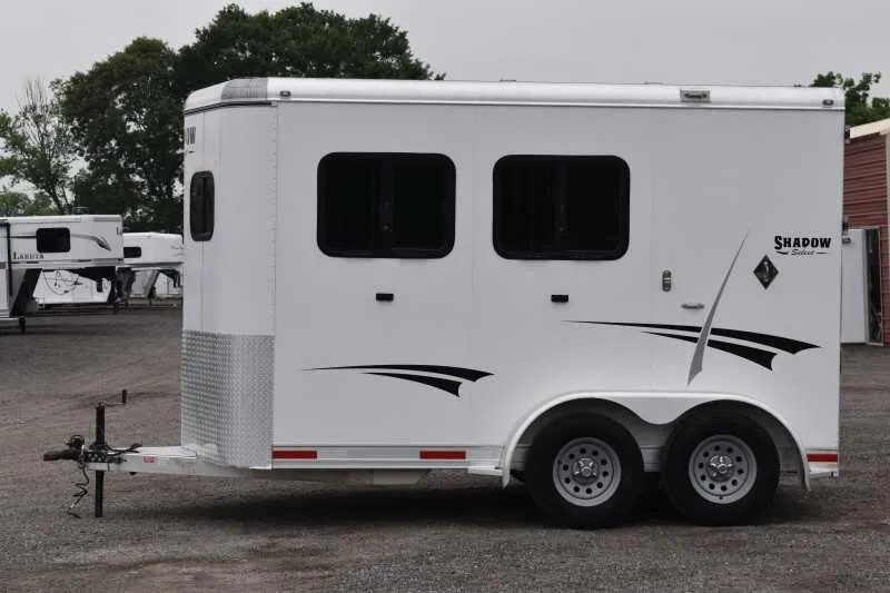 2013 Shadow 2HSL 2 Horse Trailer – Aluminum, Dressing Room – Direct side profile of the left side of the white horse trailer