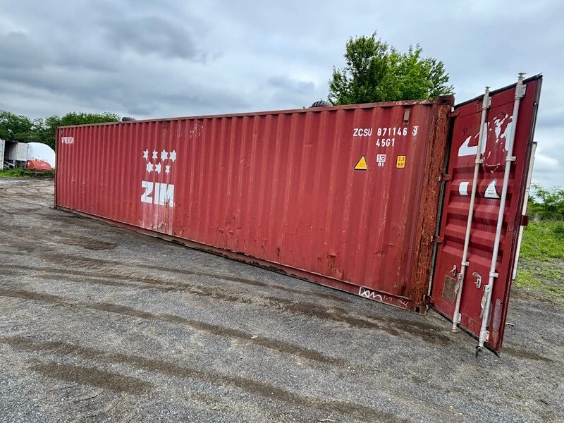 45ft Used High Cube Shipping Container – Red Storage Unit – weathered red shipping container with cargo door swung open