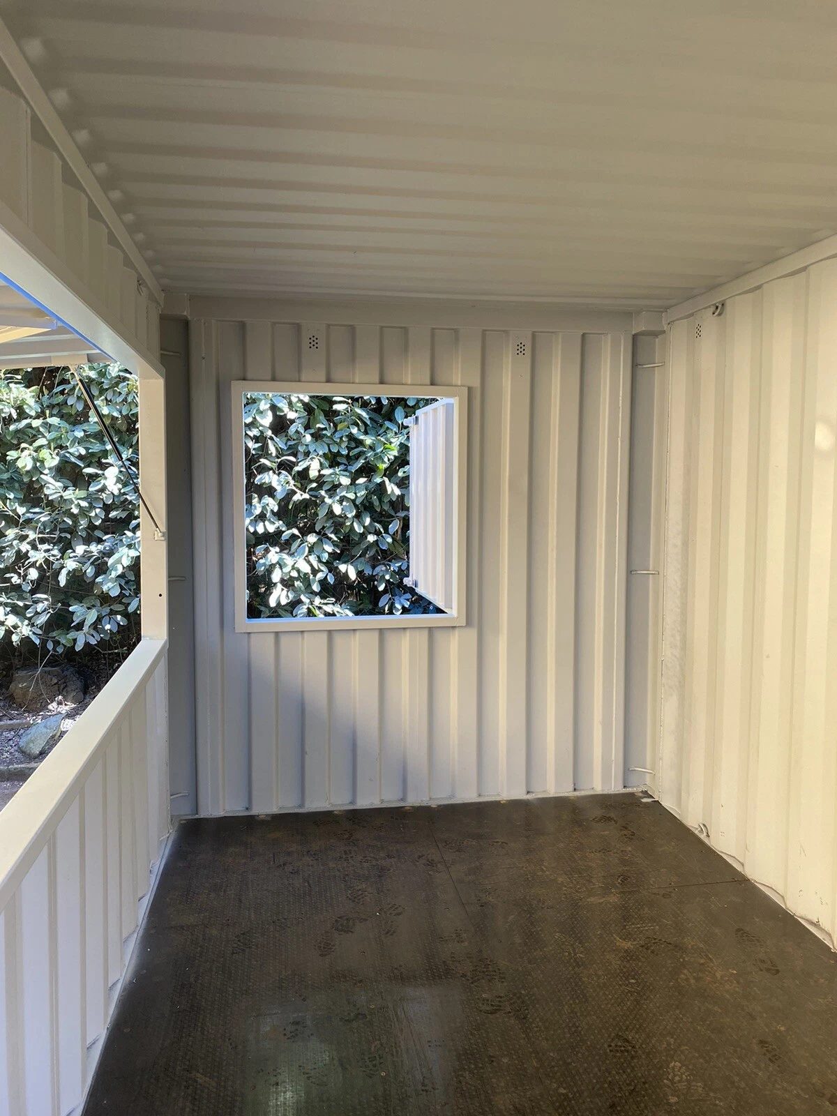 15ft Custom Container Bar & Kiosk – Side Service Hatches – empty container interior with open service hatch and window