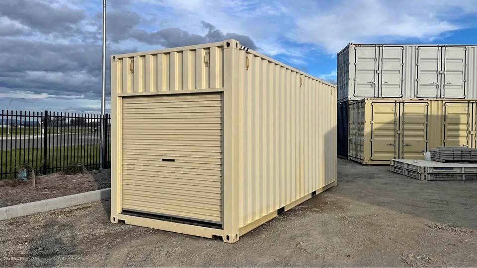 20ft High Cube Shipping Container – Rear Rollup Door – three-quarter exterior view with closed rollup door