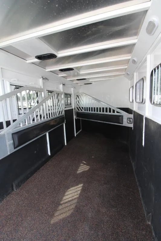 2019 Trails West 4 Horse Trailer – Convenience Package – Interior horse stall area showing aluminum dividers and padded walls