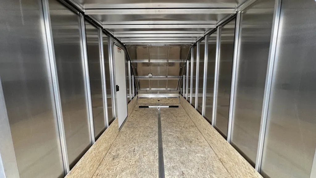 2024 Mission Trailers Crossover Trailer – Galvanized Package – Interior view looking towards the front showing the slanted crossover nose