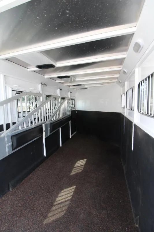 2019 Trails West 4 Horse Trailer – Convenience Package – Empty interior horse stalls with dividers folded against the side wall