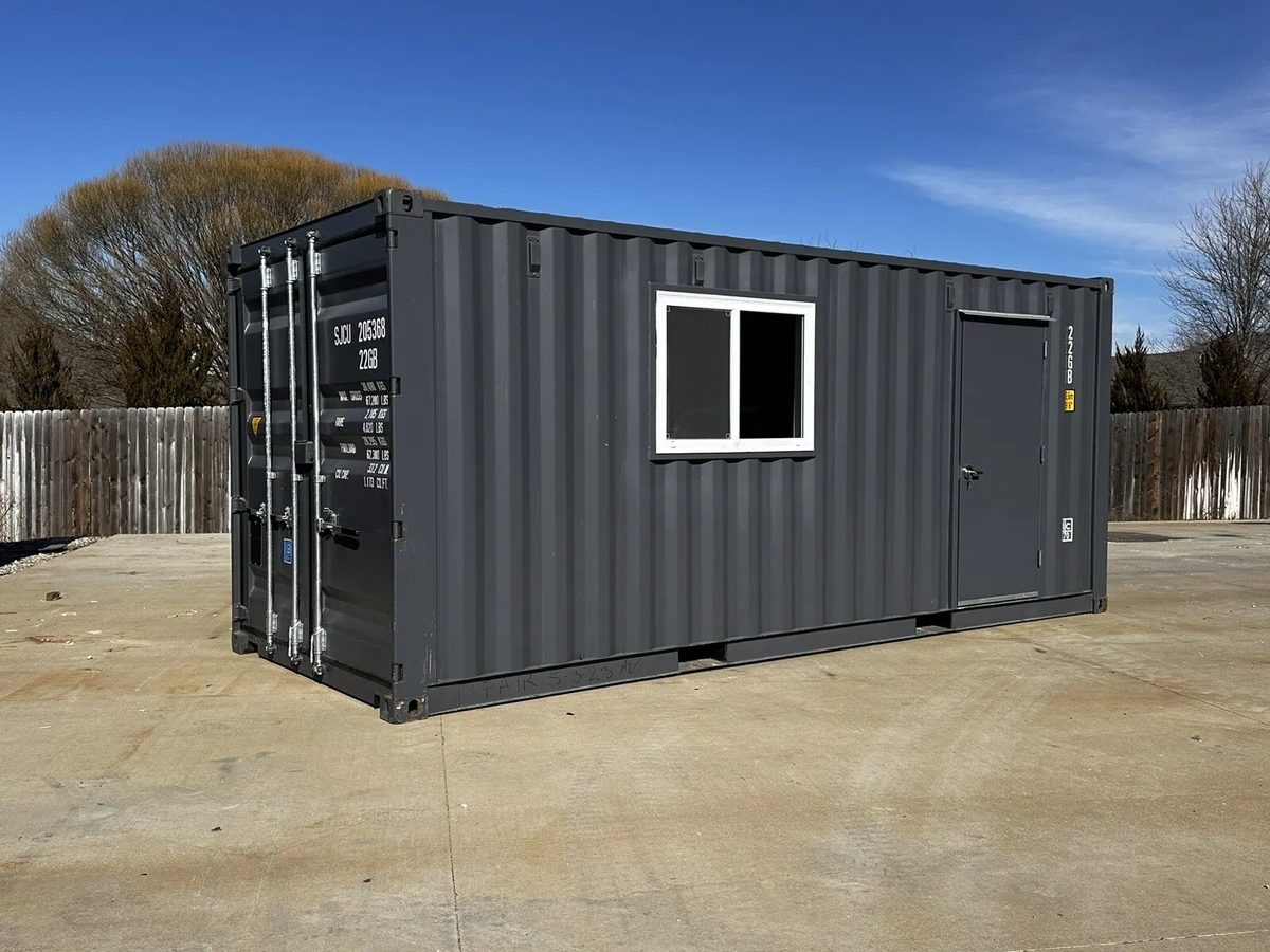 20ft Prefabricated Metal Office – Slate Gray Shiplap – Three-quarter exterior with cargo doors, window and side entry door