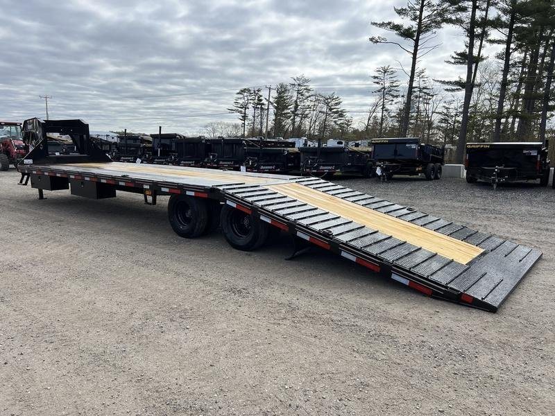 2024 Diamond C 35 ft Equipment Trailer – Auto Dovetail – The rear ramp of the trailer lowered to the ground for loading