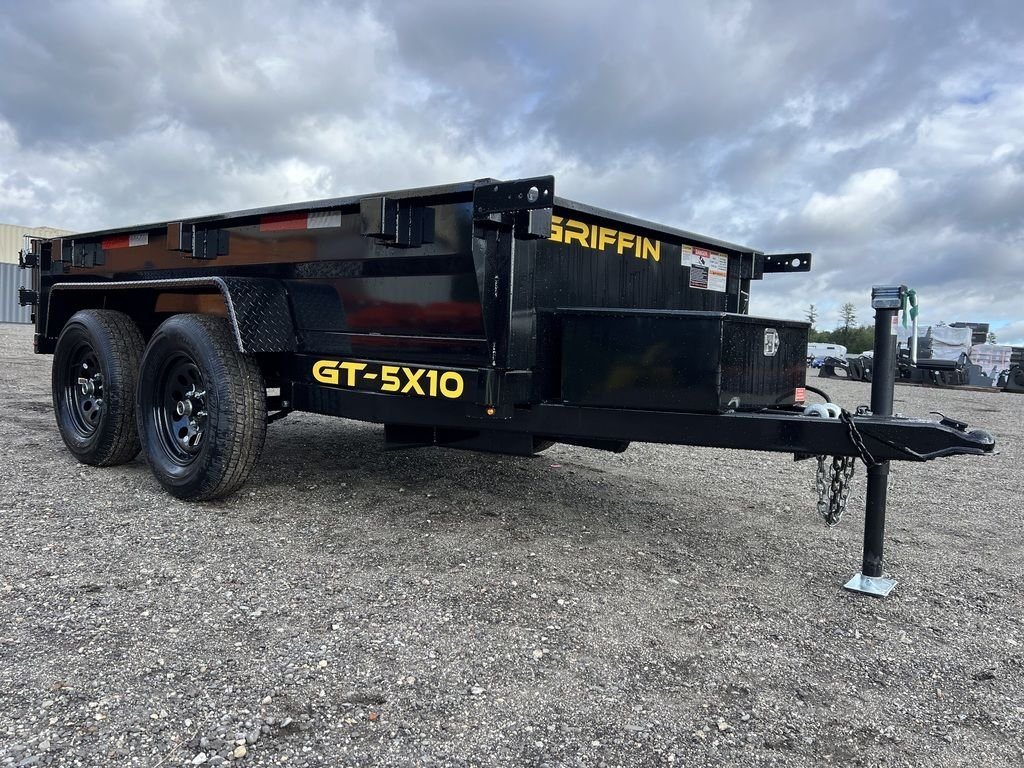2024 Griffin Trailers 10 ft Dump – Barn Door Gate – The front right side view of the black dump trailer showing the coupler