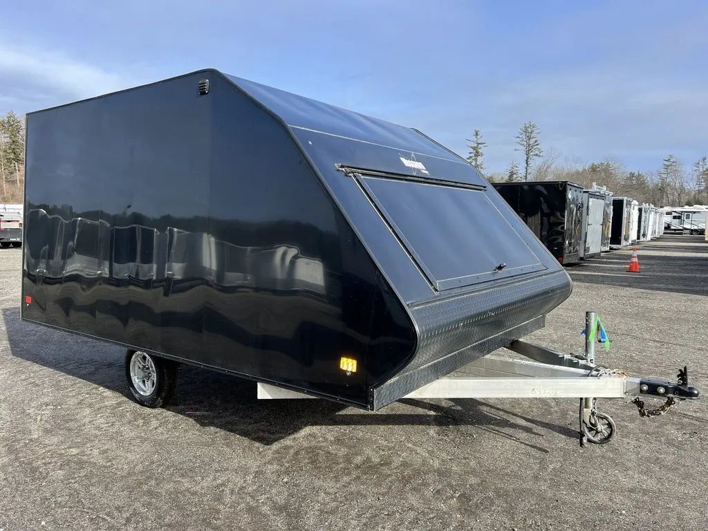 2021 Mission Trailers 2-Place Hybrid – Blackout Package – Front three-quarter view of the right side showing the smooth black finish
