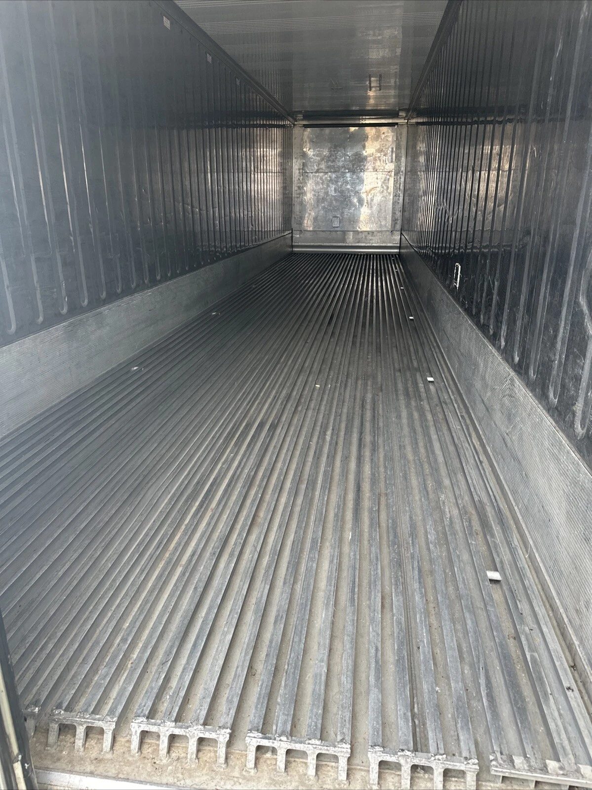 40ft Refrigerated Shipping Container – Daikin Cooling – empty refrigerated container interior with ribbed metal flooring