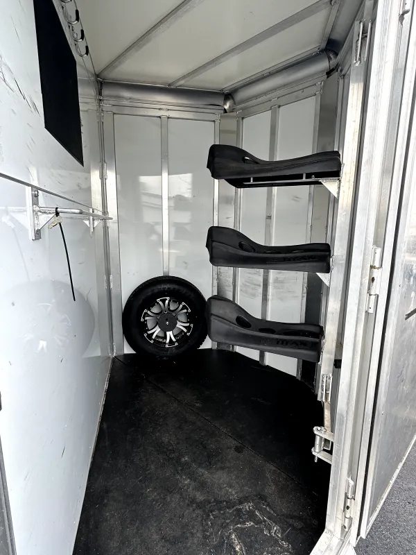 2021 Titan 2 Horse Bumper Pull Trailer – White, Slant Load – Interior of tack room with saddle racks and spare tire mount