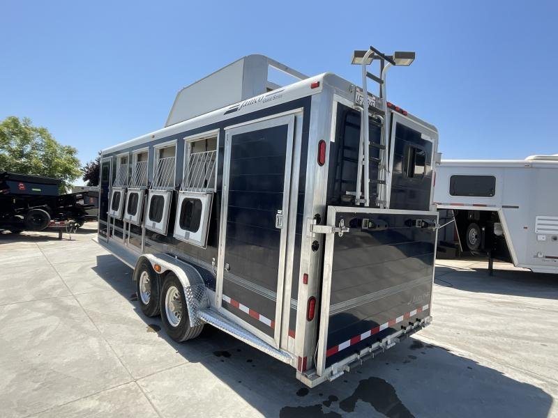 2005 Jamco 4 Horse Gooseneck Trailer – Blue, Air Suspension – Rear three-quarter view showing the passenger side and the back of the trailer