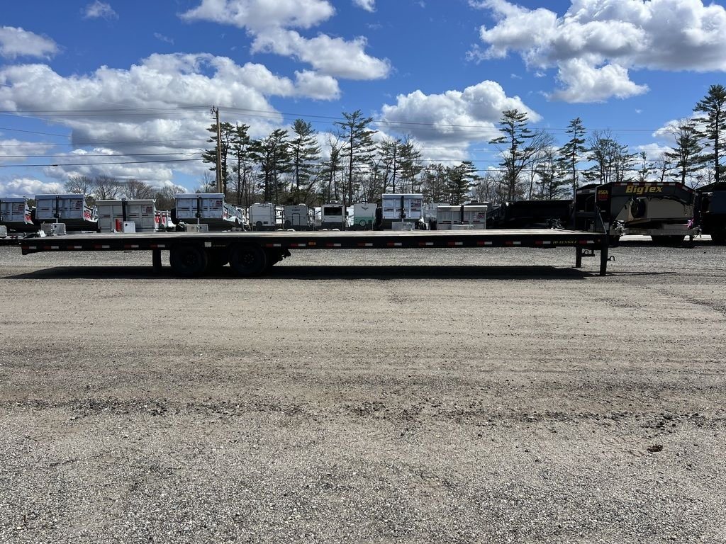 2023 Big Tex 40 ft Equipment Trailer – Slide-Out Ramps – Side view of the trailer highlighting the long flatbed and gooseneck design