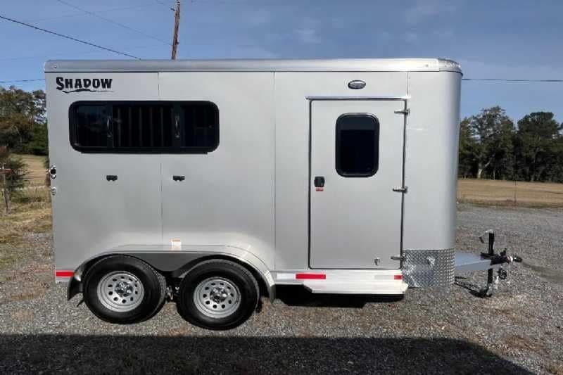 2024 Shadow 2 Horse Bumper Pull Trailer – Aluminum, Dressing Room – Straight side profile of the trailer with the dressing room door closed