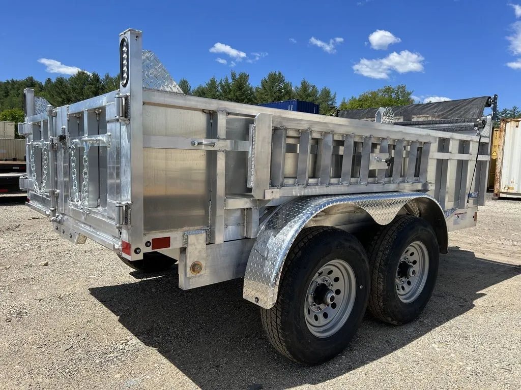 2024 Cargo Pro 12 ft Dump Trailer – Aluminum – Rear three-quarter view showing the barn door style gate configuration