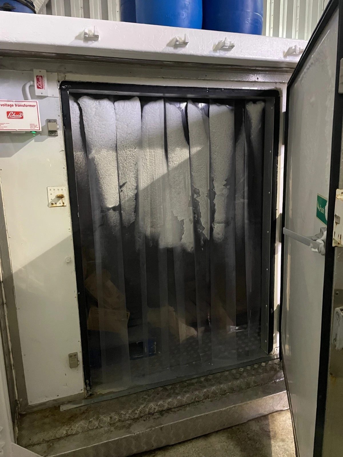 10ft Refrigerated Shipping Container – Fridge and Freezer – open refrigerated container doorway with frosted plastic strip curtains