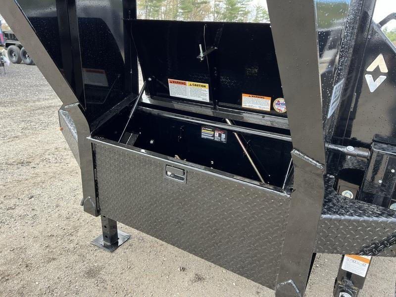 2024 Diamond C 35 ft Equipment Trailer – Auto Dovetail – An open black metal storage box located on the trailer frame