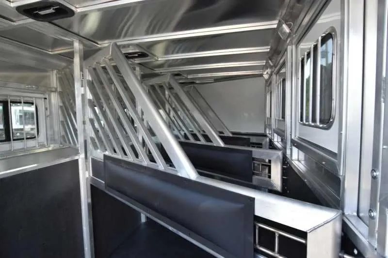 2018 Lakota 4 Horse Trailer – 2 ft Short Wall – View of multiple padded horse stalls inside the aluminum trailer