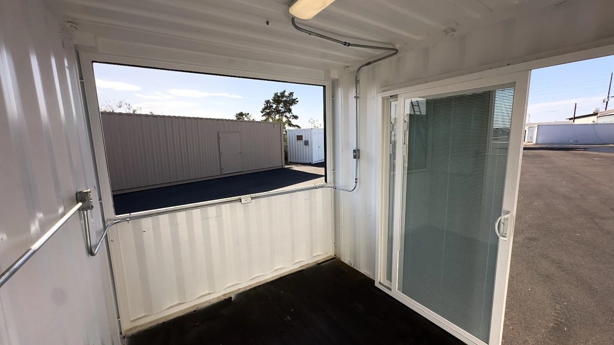 10ft Newly Built Concession Stand – Flip-Up Service Window – empty concession stand interior with serving opening and sliding door