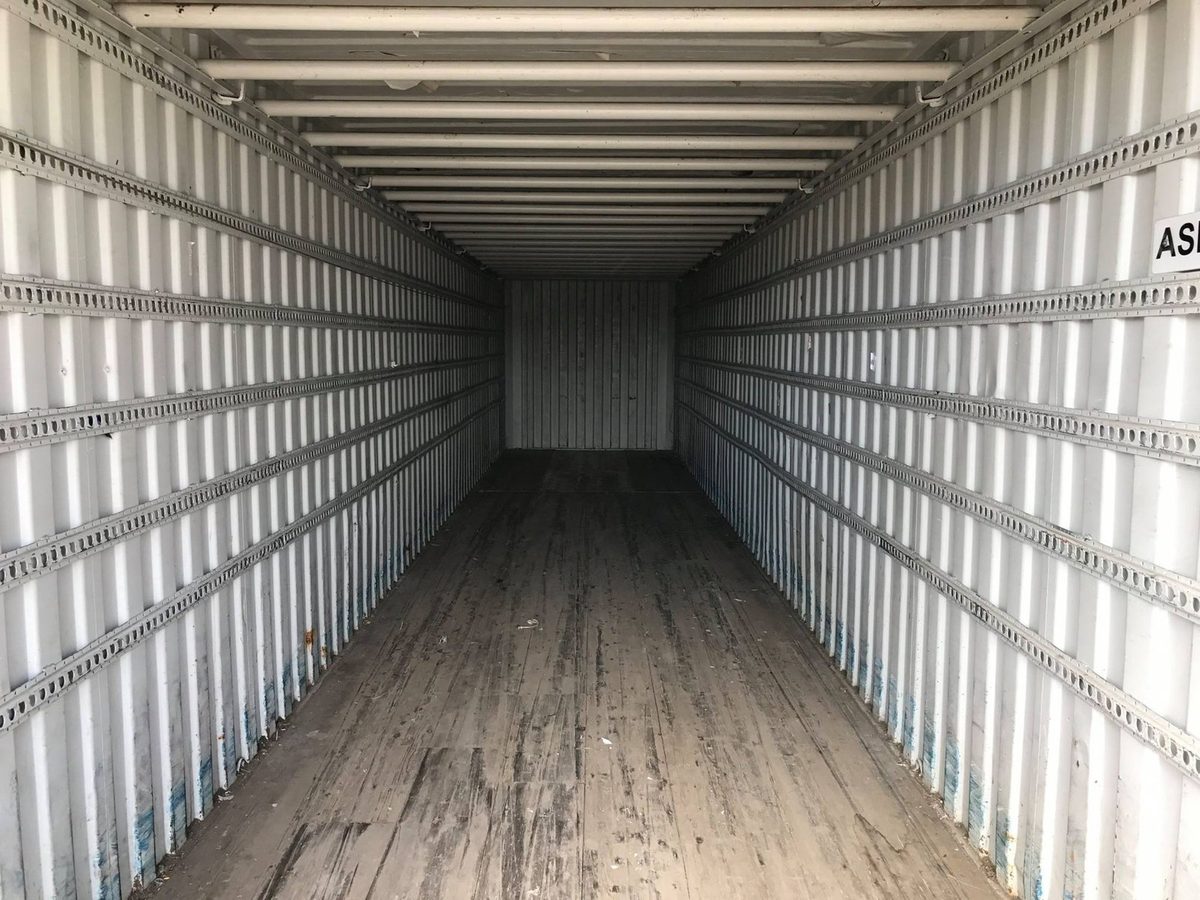 45ft High Cube Shipping Container – Used, Large-Capacity Storage – empty container interior with wooden floor and cargo securing rails