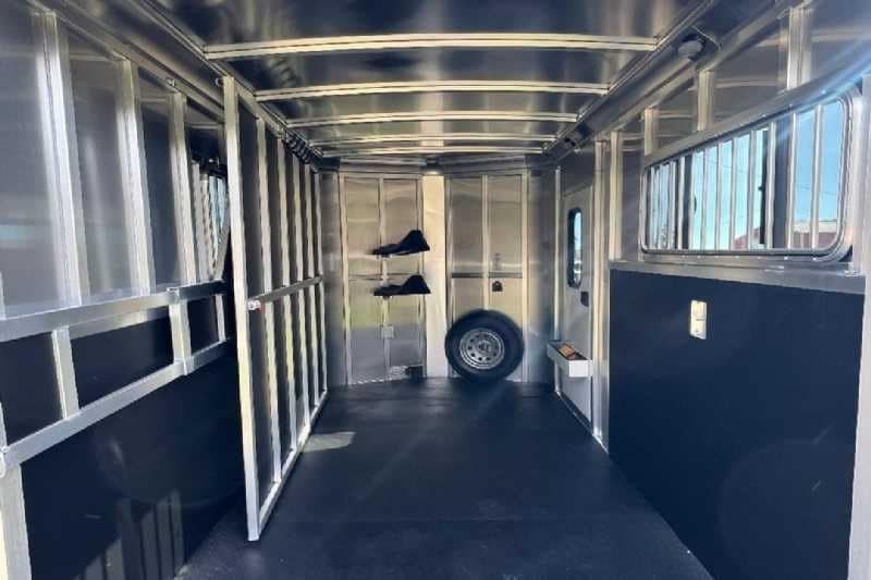2024 Shadow 2 Horse Bumper Pull Trailer – Aluminum, Dressing Room – Wide angle interior shot showing the horse stalls and tack room divider