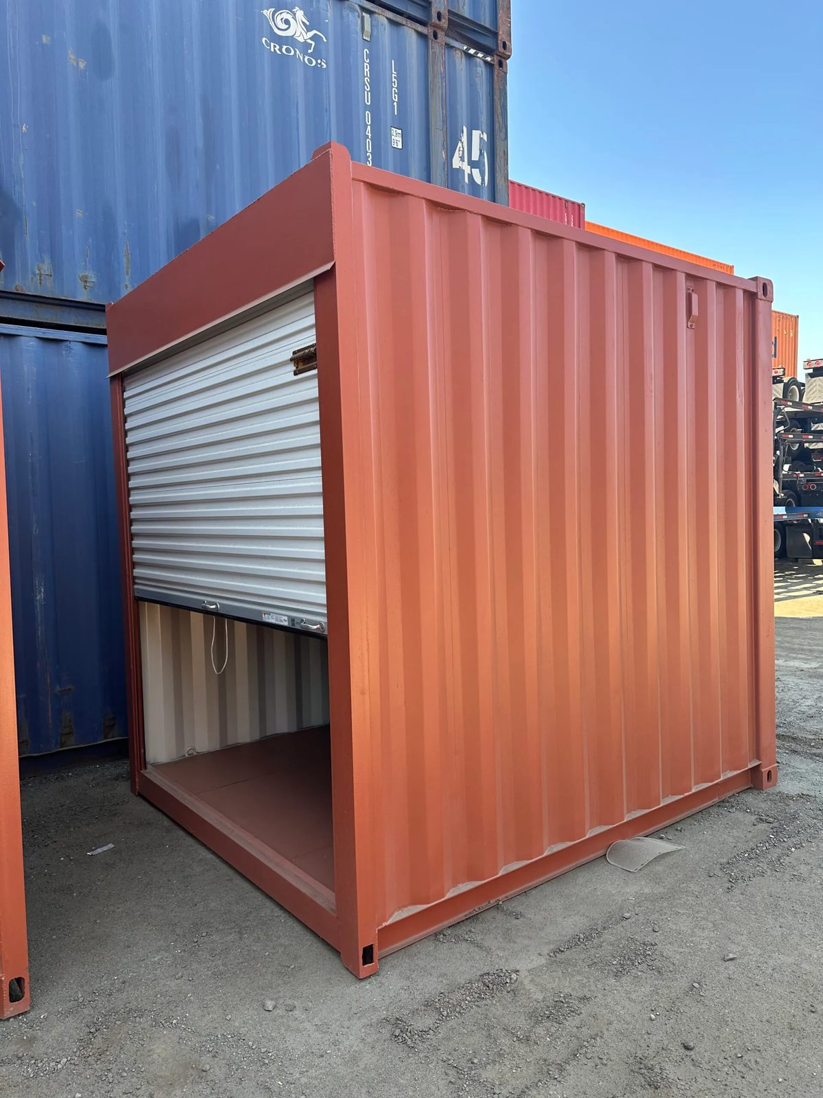 10ft Non-ISO Storage Container – Roll-Up Door – three-quarter exterior view with partially open roll-up door