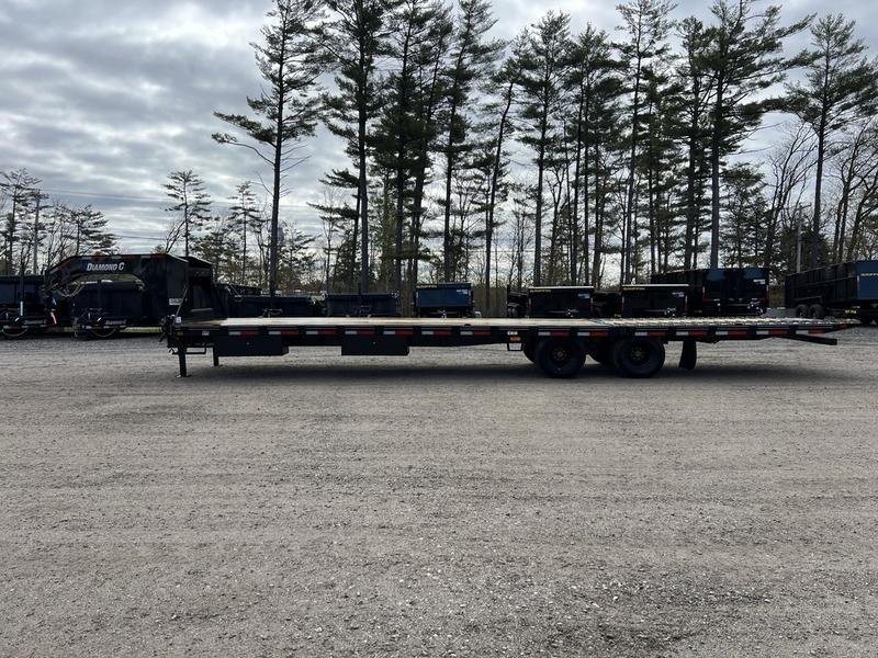 2024 Diamond C 35 ft Equipment Trailer – Auto Dovetail – Full side view of a black gooseneck equipment trailer with wood decking