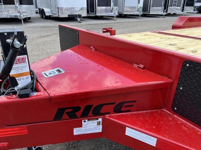 2024 Rice Trailers 22 ft Tilt Deck – Red, Toolbox – Close-up of the front toolbox area with a latch and brand decal