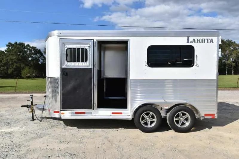 2018 Lakota 2HBPST 2 Horse Trailer – Dressing Room – Side view of the trailer with the access door wide open