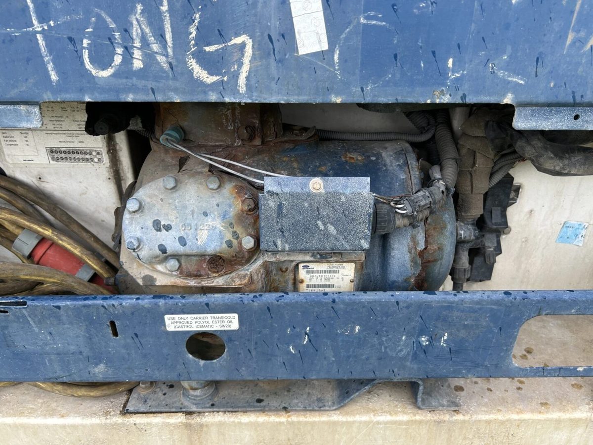 40ft High Cube Refrigerated Container – Insulated Storage – close-up of weathered refrigeration compressor and electrical wiring