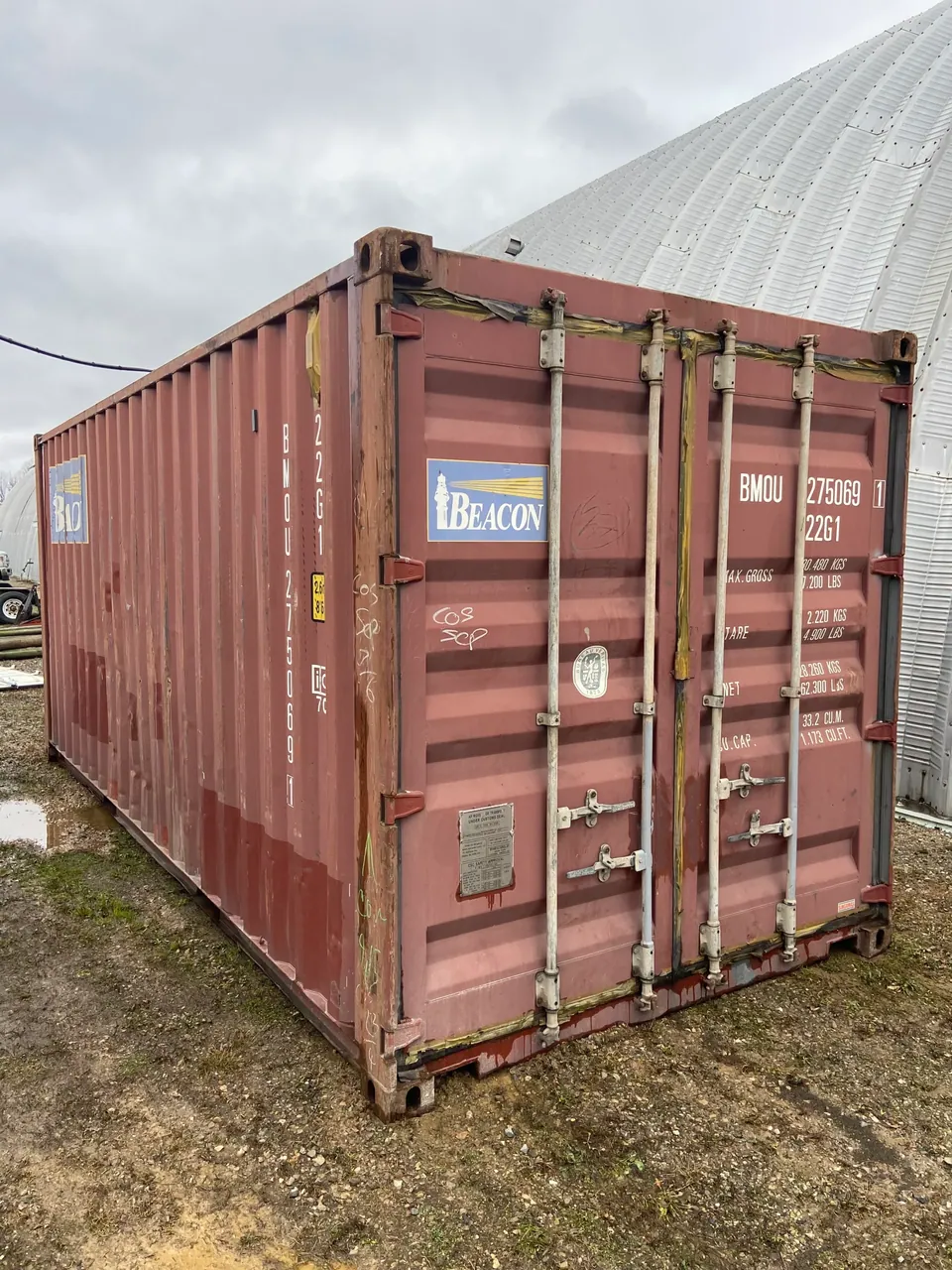 20ft Used Shipping Container – Double Cargo Doors – three-quarter exterior view of weathered container with cargo doors closed
