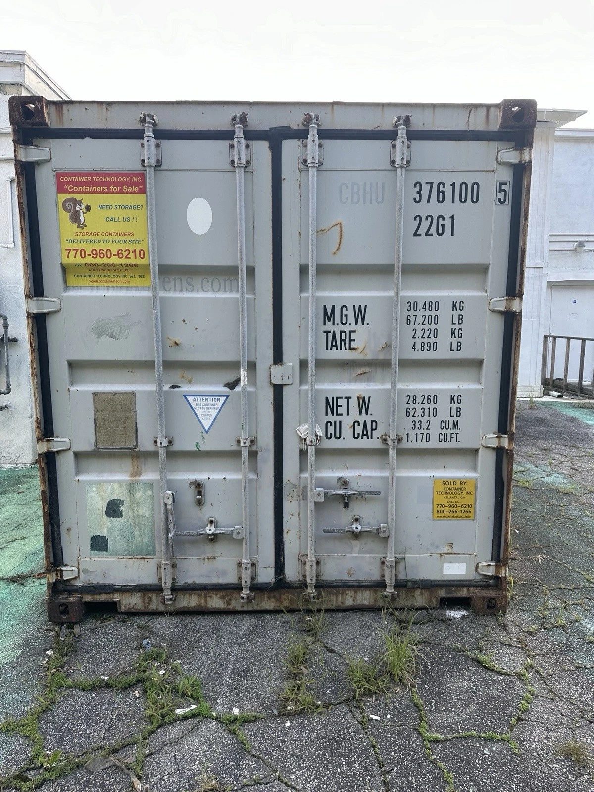 20ft Used Shipping Container – Lockable Storage – front view of weathered container with cargo doors closed